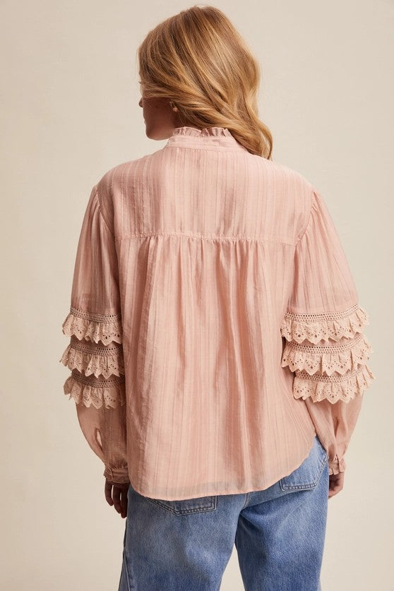 Blusa con maniche a balze rosa