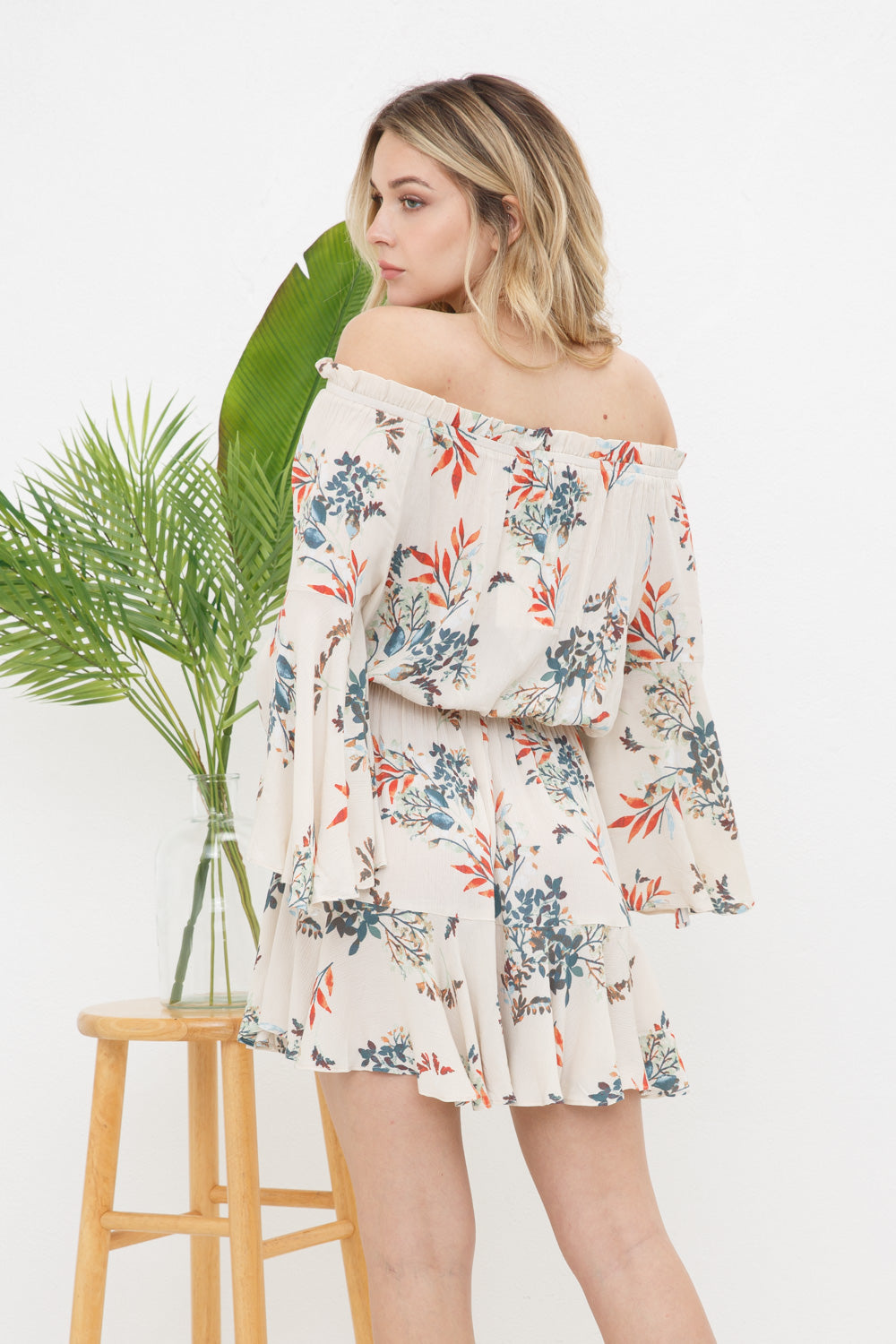 Tutina con fantasia floreale