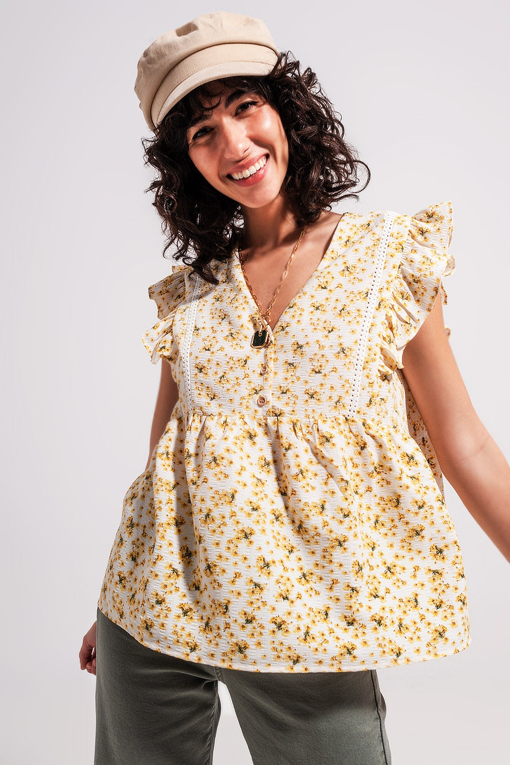 Blusa floreale in giallo