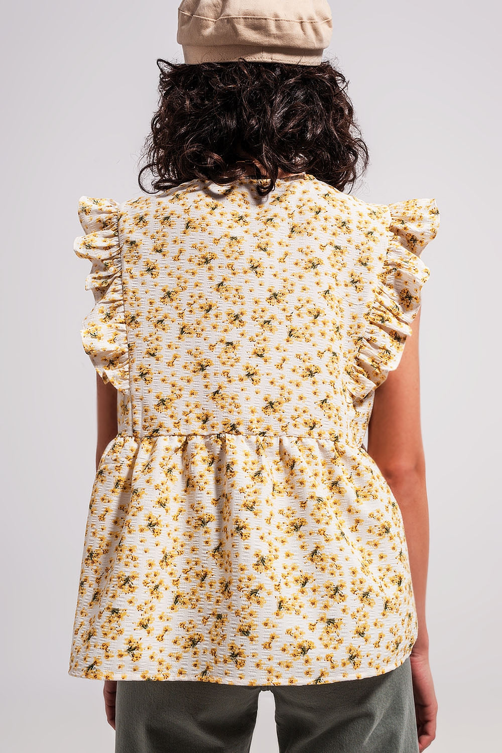 Blusa floreale in giallo