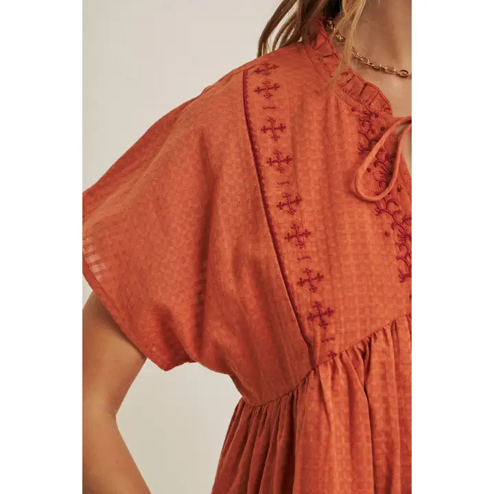 Blusa babydoll arancio bruciato