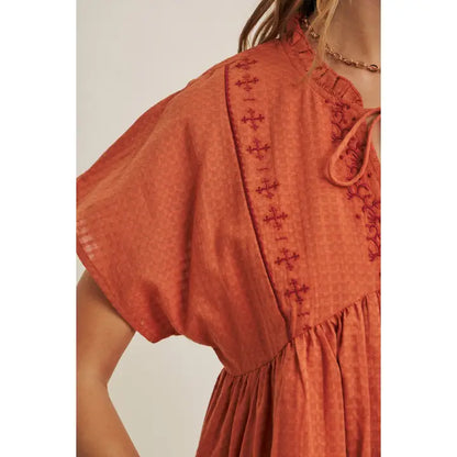 Blusa babydoll arancio bruciato