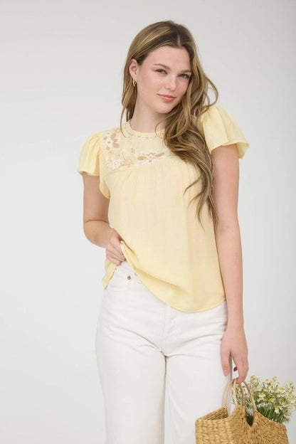 Blusa con ricamo avorio/beige