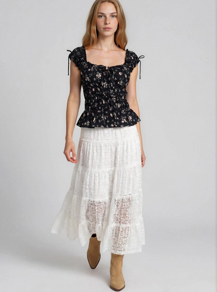 Top nero floreale
