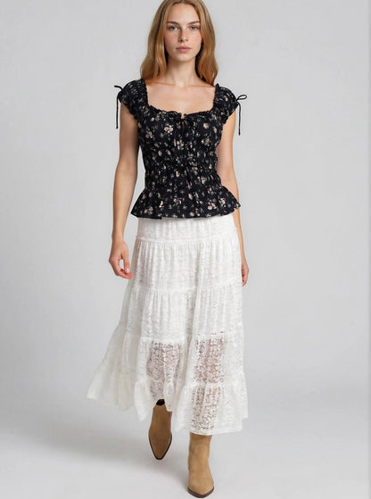 Top nero floreale