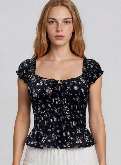 Top nero floreale