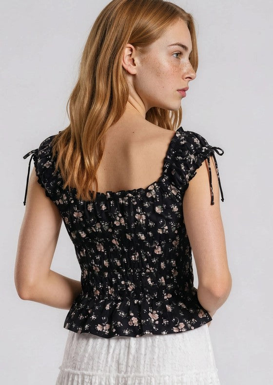 Top nero floreale