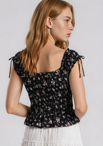 Top nero floreale